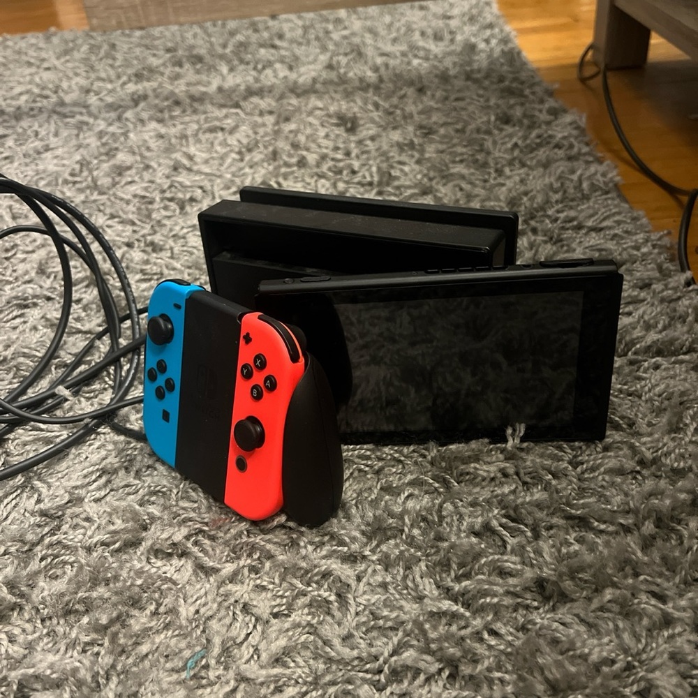 Nintendo Switch with 3 physically games.
